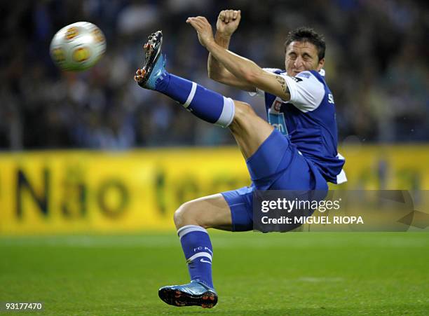 Porto's Cristian Rodriguez from Uruguay jumps for the ball during their Portuguese league football match against Academica at the Dragao Stadium in...