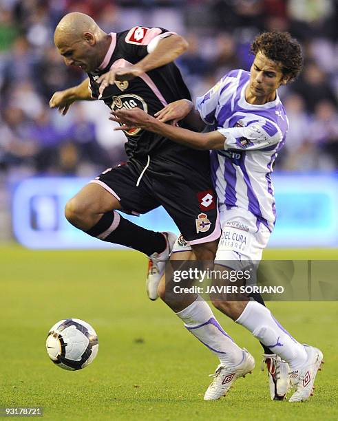 Deportivo Coruna's defender Manuel Pablo vies with Valladolid's forward Marquitos during a Spanish league football match against Deportivo de la...