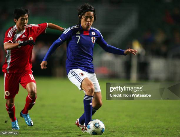Yasuhito Endo of Japan in action during AFC Asia Cup 2011 Qatar qualifier match between Hong Kong and Japan at Hong Kong Stadium on November 18, 2009...
