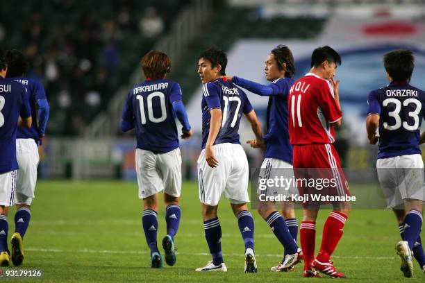 Makoto Hasebe of Japan celebrates the first goal during AFC Asia Cup 2011 Qatar qualifier match between Hong Kong and Japan at Hong Kong Stadium on...