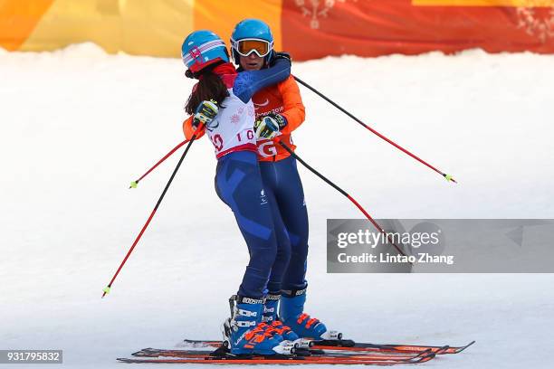 Silver Medalist Menna Fitzpatrick of Great Britain celebrates with her guide Jennifer Kehoe after the Women's Giant Slalom Run 2 - Visually Impaired...