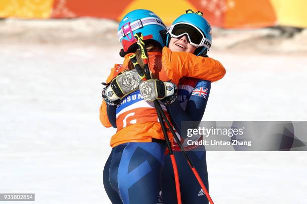 Silver Medalists Menna Fitzpatrick of Great Britain celebrates with her guide Jennifer Kehoe after she competes in Women's Giant Slalom Run 2 -...