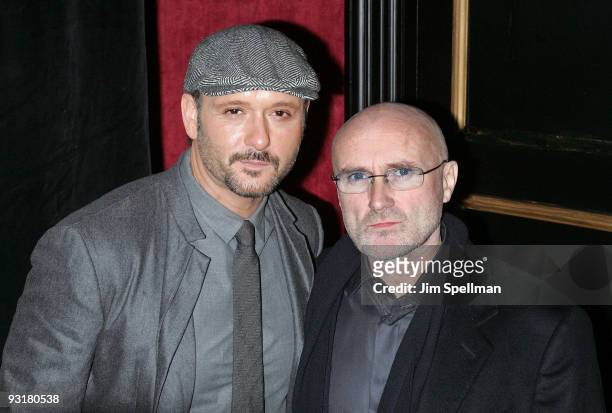 Musicians Tim McGraw and Phil Collins attend "The Blind Side" premiere at the Ziegfeld Theatre on November 17, 2009 in New York City.
