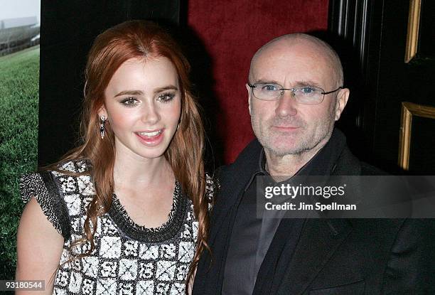 Actress Lily Collins and Musician Phil Collins attend "The Blind Side" premiere at the Ziegfeld Theatre on November 17, 2009 in New York City.