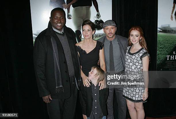 Actors Quinton Aaron, actress Sandra Bullock, actor Jae Head, actor/musician Tim McGraw and actress Lily Collins attend "The Blind Side" premiere at...