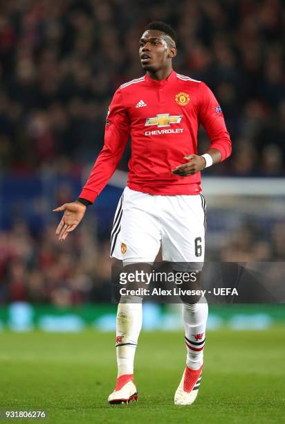 Paul Pogba of Manchester United looks for the ball during the UEFA Champions League Round of 16 Second Leg match between Manchester United and...