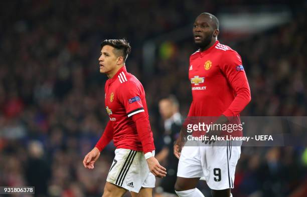 Alexis Sanchez and Romelu Lukaku of Manchester United look on during the UEFA Champions League Round of 16 Second Leg match between Manchester United...