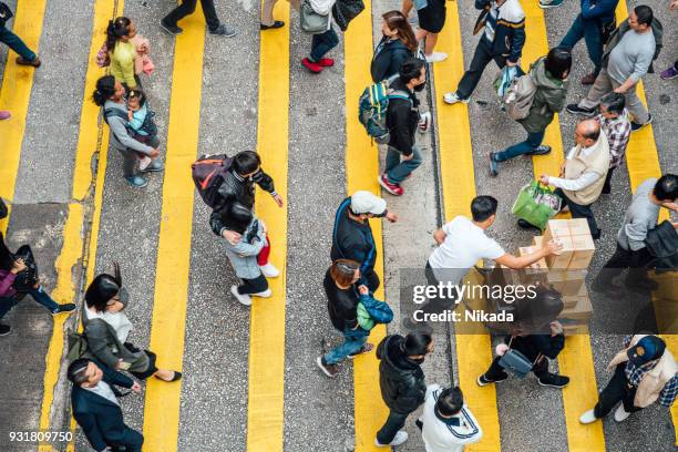 people rush in hong kong, china - asphalt cross section stock pictures, royalty-free photos & images