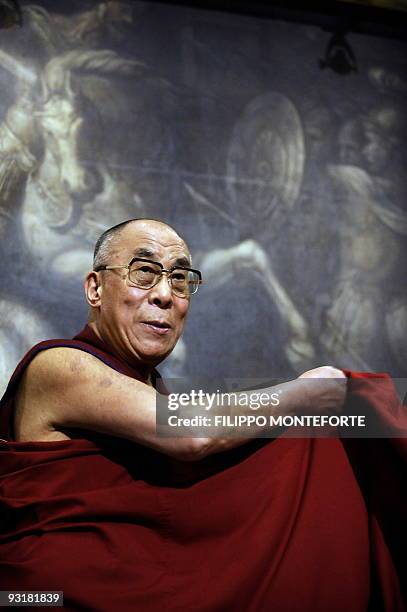 Tibet's exiled spiritual leader the Dalai Lama arrives at the Italian parliament for a conference on Tibet at the Italian Parliament on November 18,...