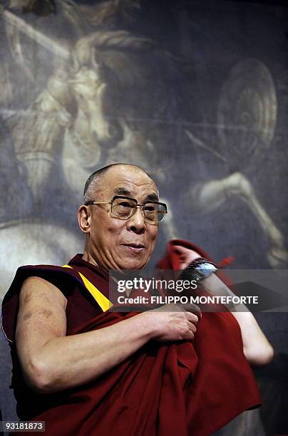 Tibet's exiled spiritual leader the Dalai Lama takes place for a conference on Tibet at the Italian Parliament on November 18, 2009 in Rome's Palazzo...