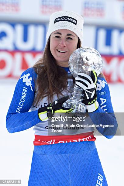 Sofia Goggia of Italy wins the globe in the women downhill standing during the Audi FIS Alpine Ski World Cup Finals Men's and Women's Downhill on...