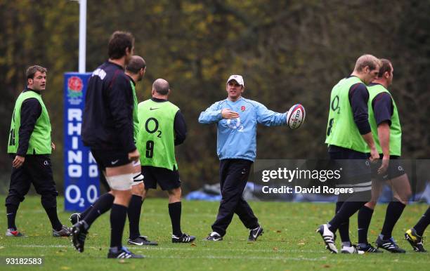 Brian Smith the England backs coach issues instuctions during an England training session at Pennyhill Park on November 18, 2009 in Bagshot, England.