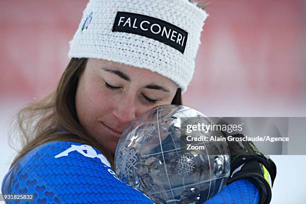 Sofia Goggia of Italy wins the globe in the women downhill standing during the Audi FIS Alpine Ski World Cup Finals Men's and Women's Downhill on...