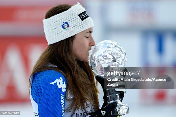 Sofia Goggia of Italy wins the globe in the women downhill standing during the Audi FIS Alpine Ski World Cup Finals Men's and Women's Downhill on...