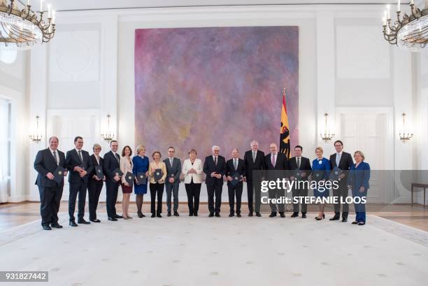 Members of the new cabinet German Chief of Staff Helge Braun, German Development Minister Gerd Mueller, Germany Minister for Education and Research...