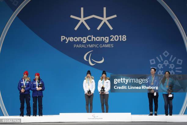 Silver medalist Menna Fitzpatrick of Great Britain and her guide Jennifer Kehoe , gold medalist Henrieta Farkasova of Slovakia and her guide Natalia...