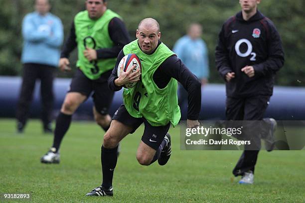 Paul Hodgson makes a break during an England training session at Pennyhill Park on November 18, 2009 in Bagshot, England.