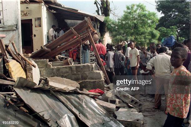 Child from Monrovia looks at the damage of his home, on October 29 which was destroyed by a rocket attack. The NPFL rebels, led by Charles Taylor, is...
