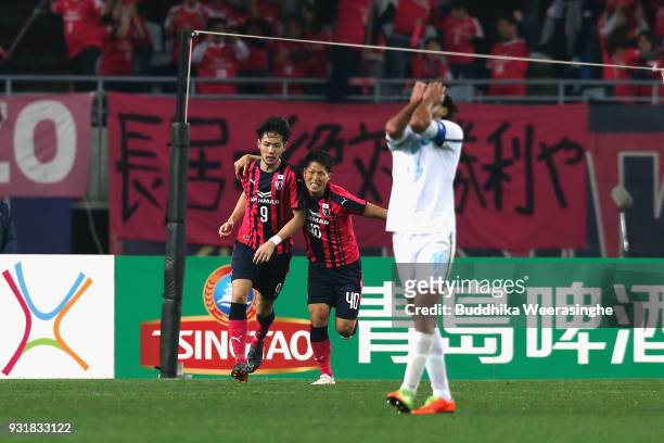 Kenyu Sugimoto of Cerezo Osaka celebrates scoring his side's second goal with his team mate Mizuki Ando during the AFC Champions League Group G game...