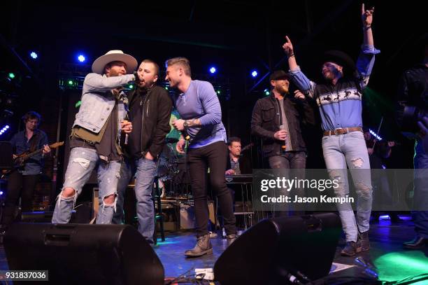 Preston Brust of LoCash, Tyler Farr, Michael Ray, Cole Swindell and Chris Lane perform at Marathon Music Works on March 13, 2018 in Nashville,...