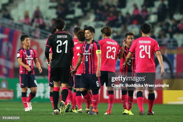 Cerezo Osaka players react after the AFC Champions League Group G game between Cerezo Osaka and Buriram United at Nagai Stadium on March 14, 2018 in...