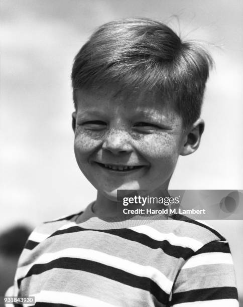 Portrait of boy with freckles on face