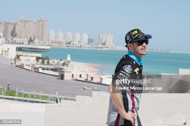 Tom Luthi of Switzerland and and Team EG 0,0 Marc VDS looks on during a visit to the Katara Cultural Centre by the MotoGP riders on March 14, 2018 in...