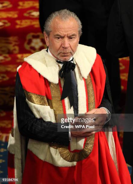 Newly appointed Lord, Sir Alan Sugar, makes his way into the Lords chamber for the Queens speech at the annual State Opening Of Parliament on...