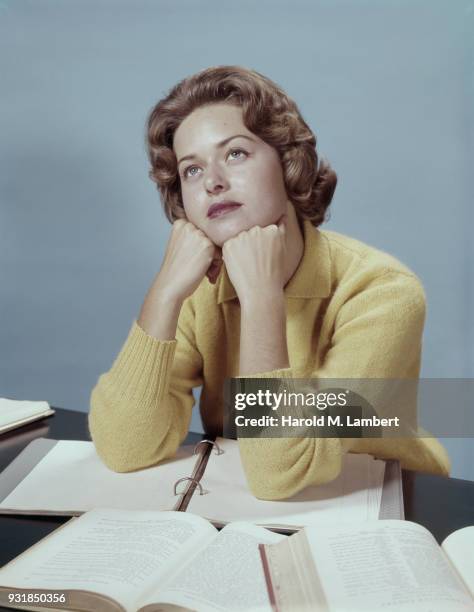 Close-up of woman thinking in office