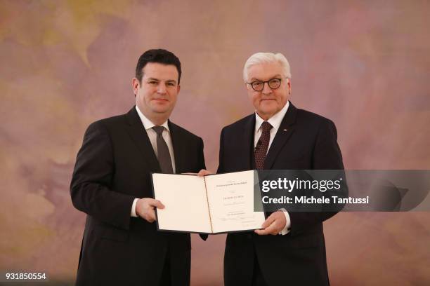 Labor and Social Affairs Ministry, Hubertus Heil, takes his oath to serve as Minister, with German President Frank-Walter Steinmeier, following the...