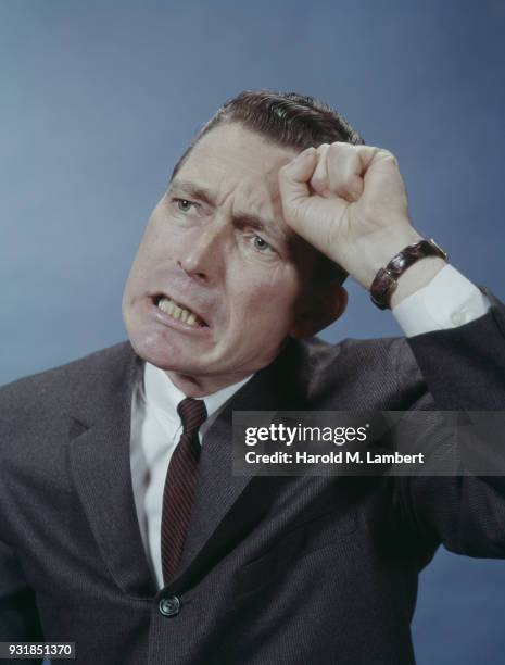 Close-up of frustrated mature businessman