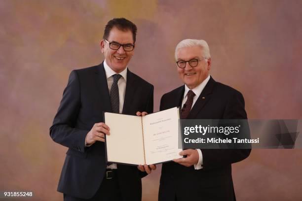 Development Minister Gerd Mueller takes his oath from Germany President Frank-Walter Steinmeier to serve as Ministrer following the election by the...