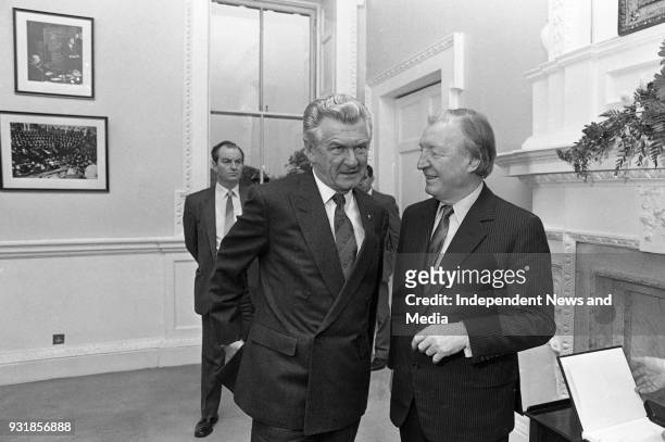 Australian Prime Minister Robert Hawke and Taoiseach Charles Haughey, meeting party leaders in Dail Eireann, .