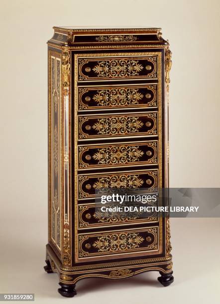 Tallboy chest of drawers with briar-root and ebonized wood veneer from the Second Empire period . France, 19th century.