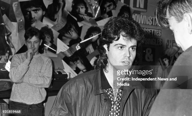 Donny Osmond signing autographs at the Virgin Mega-Store in Tallaght, Dublin, circa October 1987 .