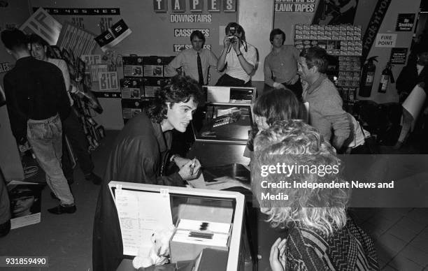 Donny Osmond signing autographs at the Virgin Mega-Store in Tallaght, Dublin, circa October 1987 .