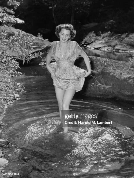 Young woman enjoying in water