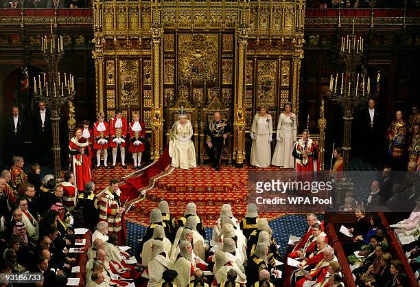 Queen Elizabeth II, accompanied by Prince Philip, Duke of Edinburgh gives her speech in the Lords chamber during the annual State opening of...