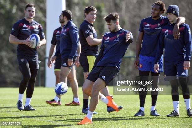 France rugby union national team fullback Hugo Bonneval controls the ball during a training session, on March 14, 2018 in Marcoussis, as part of the...