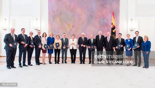 Members of the new cabinet German Chief of Staff Helge Braun, German Development Minister Gerd Mueller, Germany Minister for Education and Research...