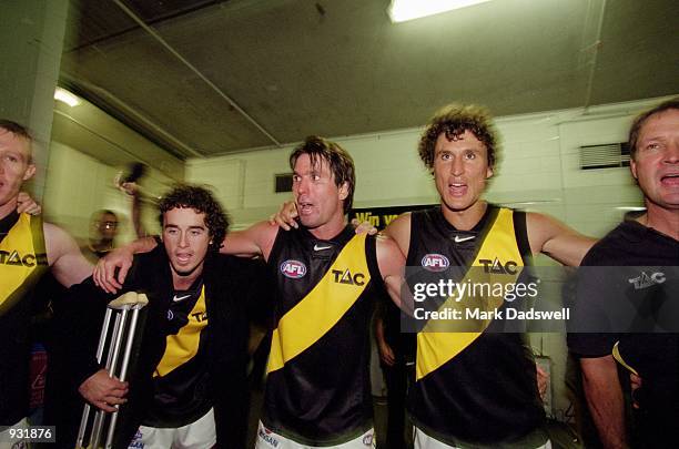 Clinton King, Wayne Campbell and Darren Gasper of Richmond celebrate their win over Melbourne during the A.F.L. Round 1 match played between the...