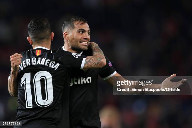 Gabriel Mercado of Sevilla celebrates with teammate Ever Banega of Sevilla during the UEFA Champions League Round of 16 Second Leg match between...