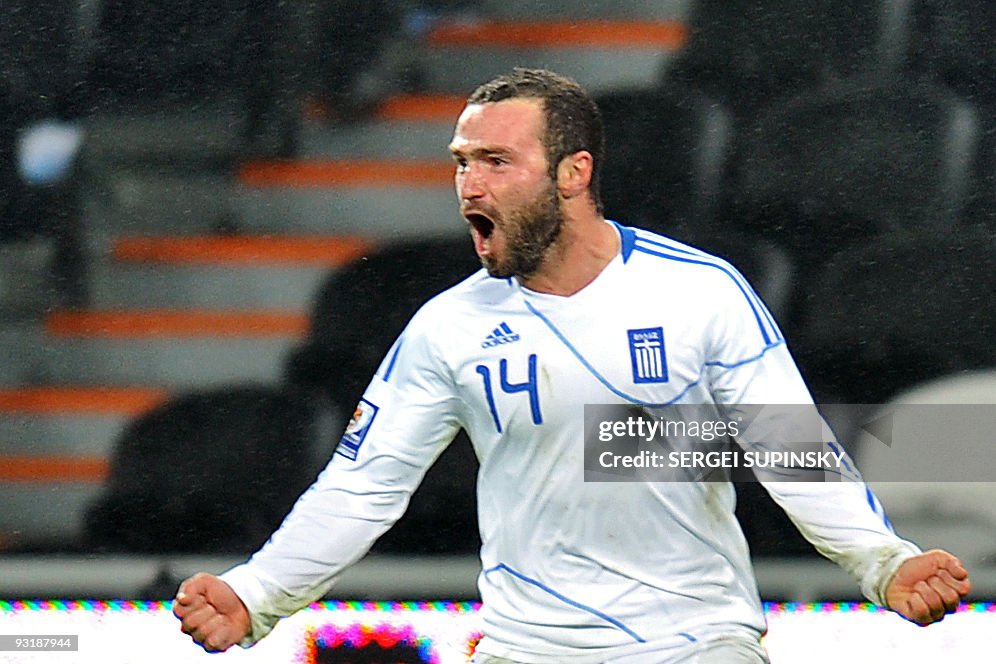 Greece's Dimitrios Salpingidis reacts af