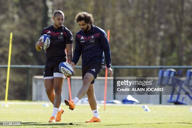 France rugby union national team players Gael Fickou and Yoann Huget take part in a training session, on March 14, 2018 in Marcoussis, as part of the...