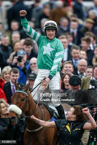 Davy Russell riding Presenting Percy win The RSA Insurance Novices' Steeple Chase at Cheltenham racecourse on Ladies Day on March 14, 2018 in...