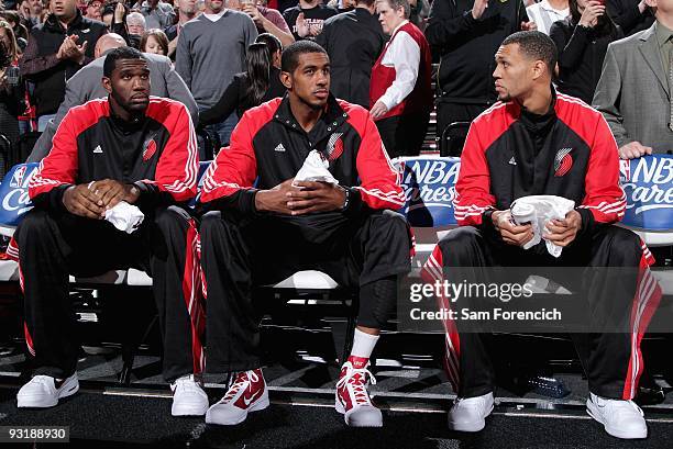 Greg Oden, LaMarcus Aldridge and Brandon Roy of the Portland Trail Blazers sit on the bench before the game against the San Antonio Spurs on November...
