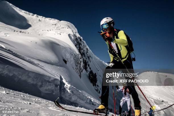 Skiers compete on March 14, 2018 during the first stage of the 33rd edition of the Pierra Menta ski mountaineering competition in Areches-Beaufort. /...