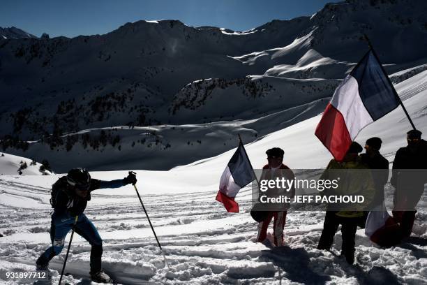 Skier competes on March 14, 2018 during the first stage of the 33rd edition of the Pierra Menta ski mountaineering competition in Areches-Beaufort. /...