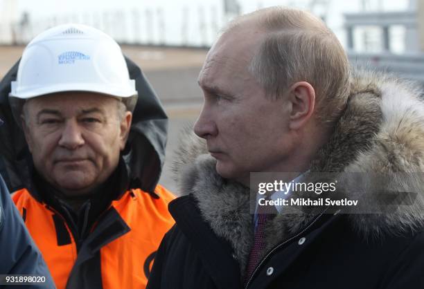 Russian President Vladimir Putin visits the construction site for the Crimean bridge which is being built to connect the Krasnodar region of Russia...