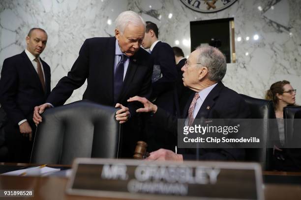 Senate Judiciary Committee Chairman member Sen. Orrin Hatch talks with Chairman Charles Grassley before a hearing about the massacre at Marjory...